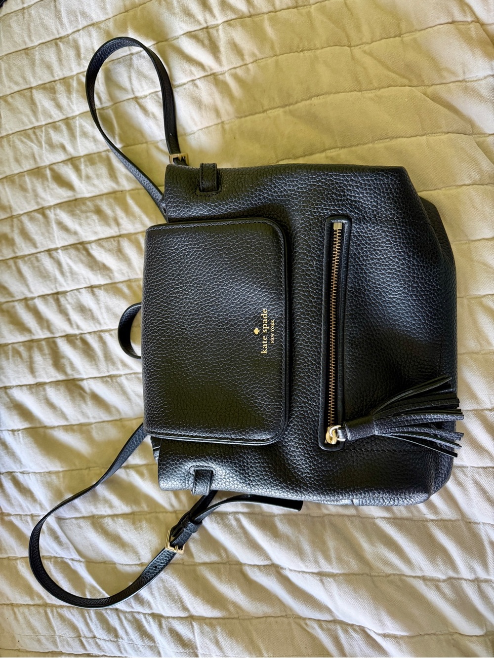 kate spade Black Pebbled Leather Drawstring Backpack with Tassel